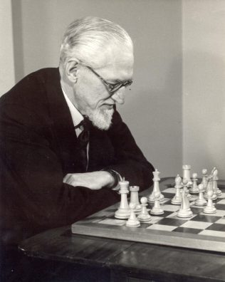 John Spedan Lewis at the chess board, 1959