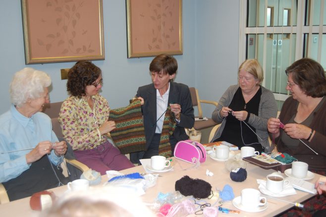 Chris Lennon (centre) and Rosalind Campbell (Rowan) with members of the Crochet and Knitting Club | Chronicle, Watford