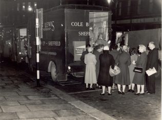 Cole Brothers Partners being carried home in a Cole Brothers van, following the 1954 bus strike. This picture encapsulated the difficulties of Post-war Britain