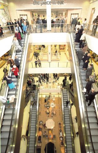 Customers crowd the elevators of the brand new John Lewis Cribbs Causeway