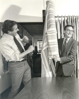 Cavendish Textiles Production Manager Harry Davy (left) sharing a joke with Partnership buyer Mr J Cross