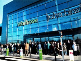 Customers queue for the delights held within John Lewis and Waitrose Customers queue for the delights held within John Lewis and Waitrose