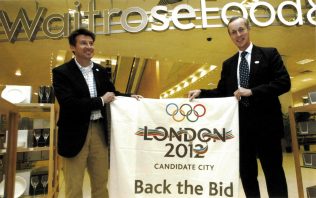 Then Partnership chairman Sir Stuart Hampson, and London 2012 Chairman Sebastian Coe hold between them a 'Back the Bid' banner, a physical embodiment of the Partnership's commitment to the London 2012 bid.