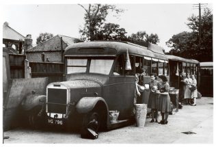 A picture from 1942 showing Bonds operating out of a fleet of buses