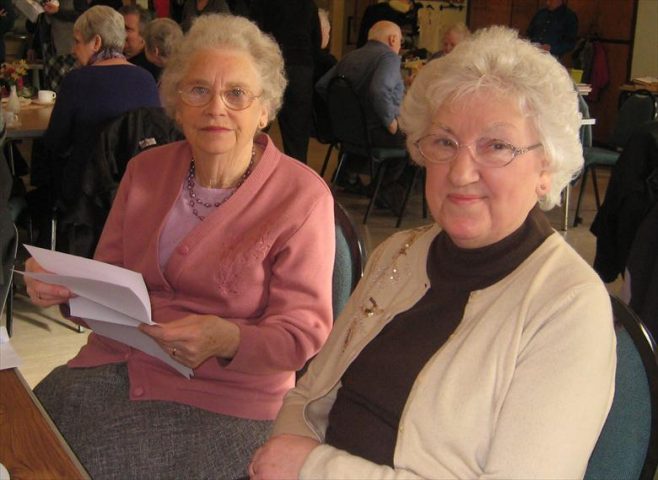 Margaret Caldecoat and Cynthia Yeo who both worked in Robert Sayle gift department for over 40 years each