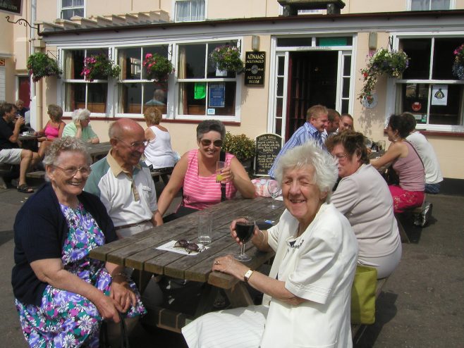 Robert Sayle Retired Partner's outing to Southwold. Enjoying some refreshment.