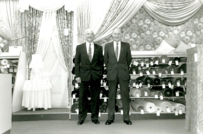 Alan Bennett on the occasion of his retirement from Robert Sayle after more than 50 years, with his colleague Harold Diver