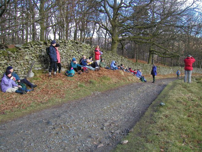 Robert Sayle Rambling Club coffee break time on Loughrigg Fell on a walk from Ambleside park.