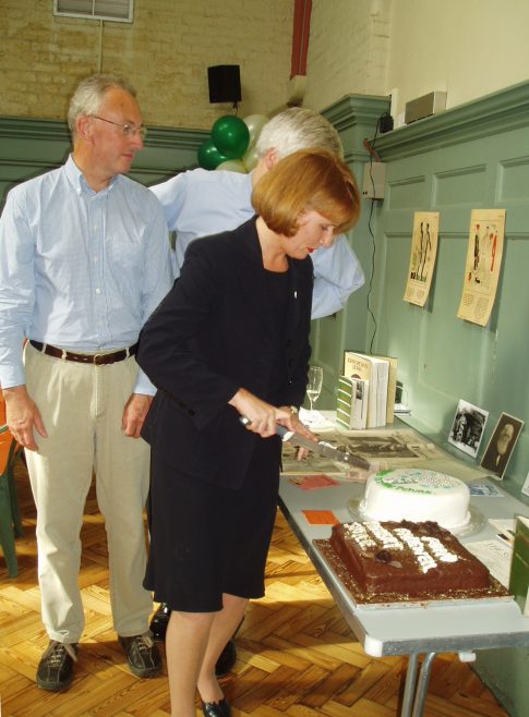 MD's of Robert Sayle, Chris Mitchell, James Furse and Jenny Tomley cutting the cake at the 75th Anniversary tea party.