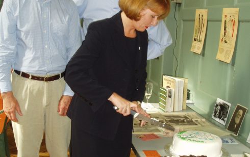 MD's of Robert Sayle, Chris Mitchell, James Furse and Jenny Tomley cutting the cake at the 75th Anniversary tea party.