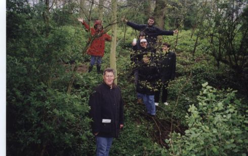 A group of wet Robert Sayle Department Managers at Madingley Hall.