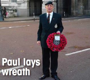 Paul lays wreath