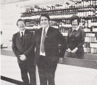 Nearest to the camera is Mr George Green - Manager, with Mr Ron Farley - Deputy Manager besides him. Miss Georgina Craythorne - Office Manager behind the counter. Nearest to the camera is Mr George Green - Manager, with Mr Ron Farley - Deputy Manager besides him. Miss Georgina Craythorne - Office Manager behind the counter.
