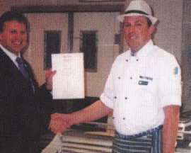 Managing Director presents certificate