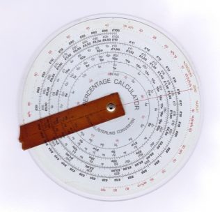 Manual profit calculator as used by Waitrose grocery buyer c1971 - showing £sd and decimal. | John Lewis Partnership archives