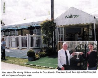 The winning Waitrose stand, Event Manager Derek Bond and Graphic Designer Neil Crowfoot display the award